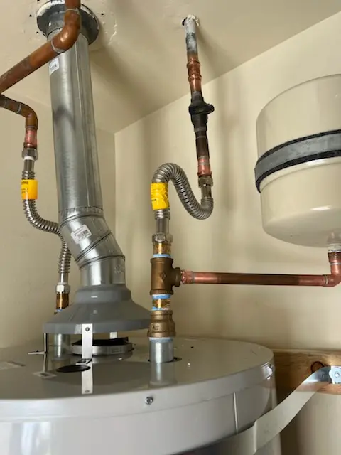Water heater installation and plumbing repair in Boles Home